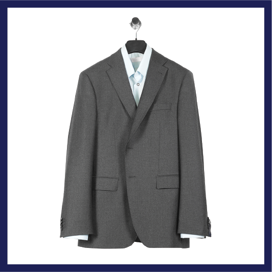 A suit on a clothes hanger.